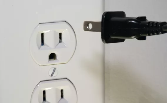 Plug going into an outlet